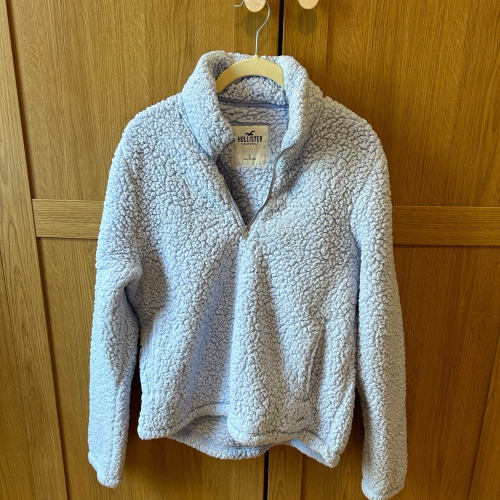 Hollister baby blue fleece quarter zip sweatshirt with pockets. Size S, fits S-L